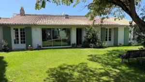 Κήπος έξω από το Maison de vacances proche plage