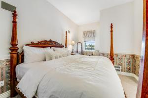 Postel nebo postele na pokoji v ubytování The Charlotte at Judith Ann Inn