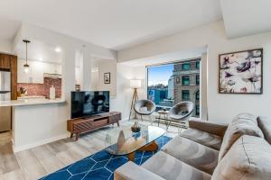 a living room with a couch and a table at Newmark Jewel in Seattle