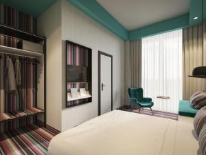 Giường trong phòng chung tại Mamaison Vibe Hotel Downtown Budapest