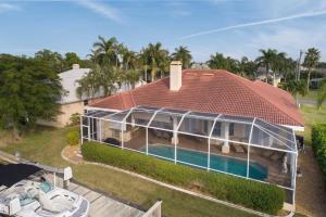 an aerial view of a house with a swimming pool at Villa Savona in Cape Coral