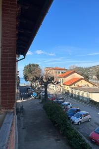 a group of cars parked in a parking lot at Levanto Charme apartment up to 6ppl 20 steps to the water in the center in Levanto