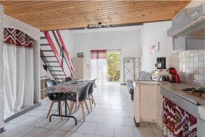 Kuchyň nebo kuchyňský kout v ubytování Gîte Le 876