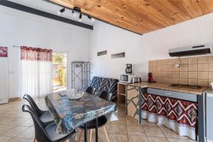 Kuchyň nebo kuchyňský kout v ubytování Gîte Le 877