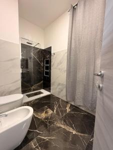 Ванная комната в Belvedere Lacinio Luxury Guest House +65 фотографий