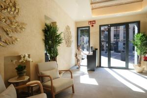 Ο χώρος του λόμπι ή της ρεσεψιόν στο SJ7 Aparthotel