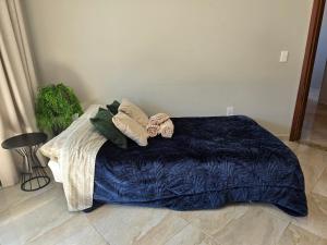 Katil atau katil-katil dalam bilik di Apartamento Agradável +19 gambar