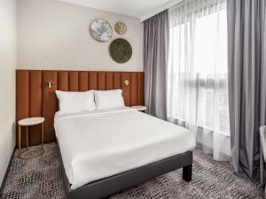 Postel nebo postele na pokoji v ubytování Mercure Bialystok + 123 fotografií