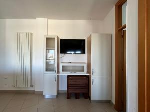 Μια τηλεόραση ή/και κέντρο ψυχαγωγίας στο Nievo-Ceccarini Pedonale Flexrent - Immobiliare Abissinia