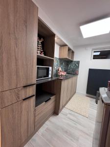 Kuchyň nebo kuchyňský kout v ubytování appartement en sous sol