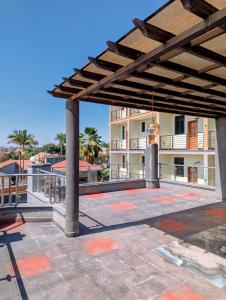 Balkón nebo terasa v ubytování Palm Gardens Guesthouse + 145 fotografií