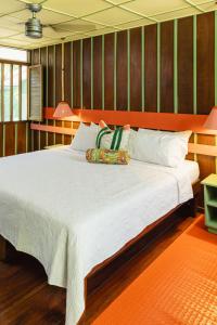 Postel nebo postele na pokoji v ubytování Mawamba Lodge