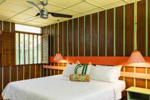 Postel nebo postele na pokoji v ubytování Mawamba Lodge