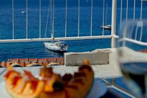 a banana sitting on a table on a cruise ship at Komiza Provita Guesthouse in Komiža