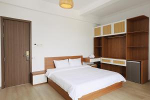 Postel nebo postele na pokoji v ubytování Nếp Homestay