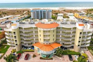 an aerial view of a building next to the beach at Salty Daze at Crystal Palms in St Pete Beach