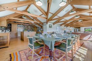a large dining room with a table and chairs at 6 Bed in Tresillian oc-t32987 in Newlyn East