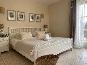 Postel nebo postele na pokoji v ubytování La Villa Baronnette