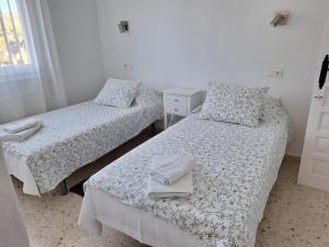 Postel nebo postele na pokoji v ubytování Chalet On The Benissa Coast + 11 fotografií