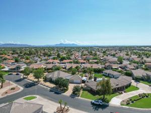 an aerial view of a suburb with houses at Luxury 6BR Retreat - Pool BBQ Theater and Games in Lemontree