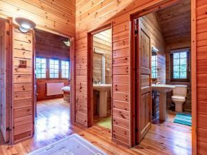 a bathroom with two sinks and two toilets at 4 Bed in Clovelly 00356 in Clovelly +12 photos