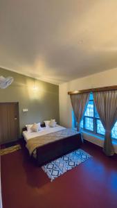 Ένα ή περισσότερα κρεβάτια σε δωμάτιο στο The Rustic Dwell