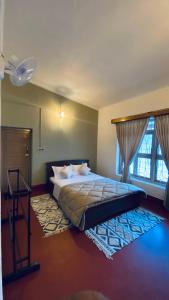 Ένα ή περισσότερα κρεβάτια σε δωμάτιο στο The Rustic Dwell