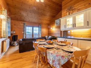 a kitchen and dining room with a table and chairs at 3 Bed in Clovelly 00359 in Clovelly