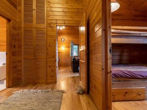 a room with two bunk beds and a hallway at 3 Bed in Clovelly 00359 in Clovelly