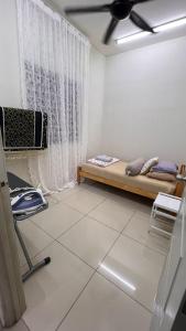 TV a/nebo společenská místnost v ubytování Homestay 236 + 1 fotografie