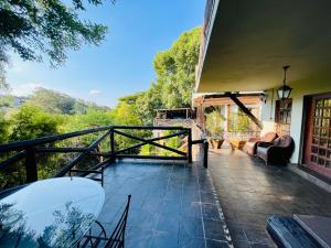 Balkón nebo terasa v ubytování Waterkloof Heights Guest House