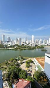an aerial view of a city with a body of water at apartamento 2 baños in Cartagena de Indias +4 photos