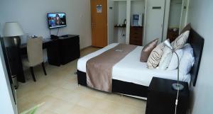 TV a/nebo společenská místnost v ubytování Mount Elgon Hotel & Spa