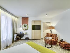 Televisyen dan/atau pusat hiburan di Mercure Katowice Centrum +98 gambar