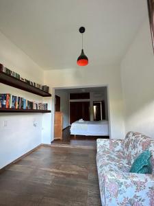 Ένα ή περισσότερα κρεβάτια σε δωμάτιο στο Casa em Penedo - Itatiaia