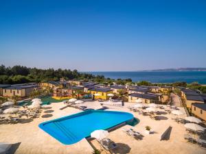 an aerial view of a swimming pool at a resort at Valamar Camping Krk in Krk