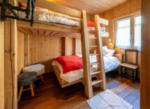 Postel nebo postele na pokoji v ubytování Chalet O'Bois-Centre Alsace