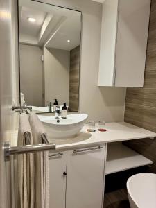 Koupelna v ubytování 214 Executive Suite, + 46 fotografií