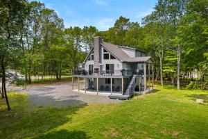 an aerial view of a house with a large yard at Hot Tub and Community Beach Albrightsville Home! in Albrightsville