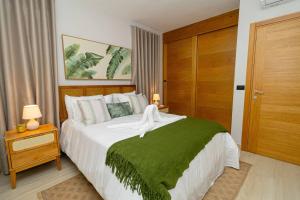 Postel nebo postele na pokoji v ubytování Tropical 2BR Getaway in Dominicus Bayahibe + 69 fotografií