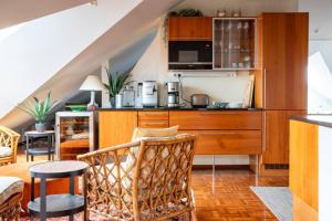 Η κουζίνα ή μικρή κουζίνα στο Penthouse Loft with Jacuzzi and Sauna +13 φωτογραφίες