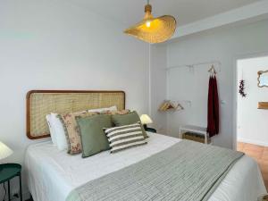 Ένα ή περισσότερα κρεβάτια σε δωμάτιο στο Pijamas House 2