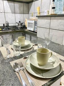 Η κουζίνα ή μικρή κουζίνα στο Apart Cavalari Kitnets