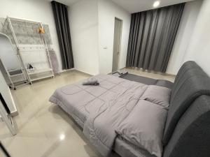 Ένα ή περισσότερα κρεβάτια σε δωμάτιο στο The Shore by AEM RESIDENCES +21 φωτογραφίες