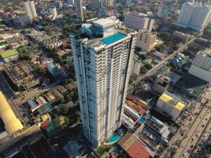 an overhead view of a tall building in a city at The Retrograde at The Crestmont in Manila