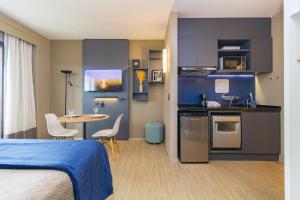 Kuchyň nebo kuchyňský kout v ubytování Flats Prime – Alpha Stay | Alphaville – Barueri – SP