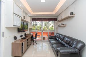 Μια τηλεόραση ή/και κέντρο ψυχαγωγίας στο Hotel em Brasilia 215 Bloco B Asa Norte 64308 +51 φωτογραφίες