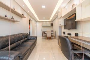 Μια τηλεόραση ή/και κέντρο ψυχαγωγίας στο Hotel em Brasilia 215 Bloco B Asa Norte 64308