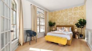 a bedroom with a bed and a yellow chair at Expansive Lakehouse W Stunning Pool & Views in The Hills