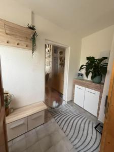 a living room with a rug on the floor at Alpenliebe in Windischgarsten +31 photos